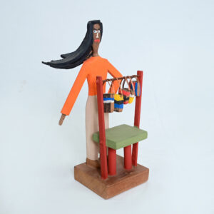 ESCULTURA VENDEDORA DE RUA